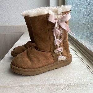 Super cute girls Uggs size 12. Brown/tan with pink ribbon.